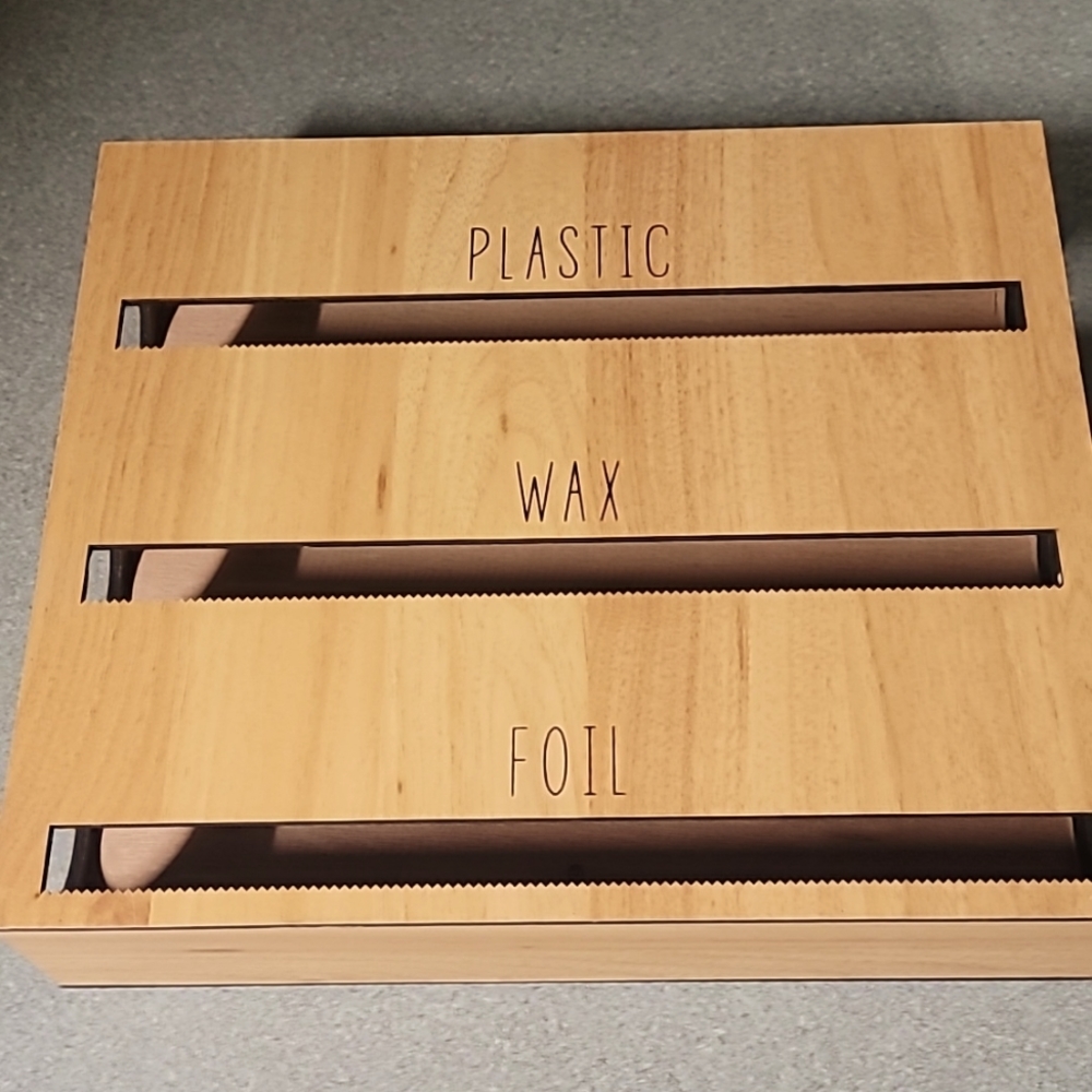 Organizer for Aluminum foil, plastic wrap and wax paper.